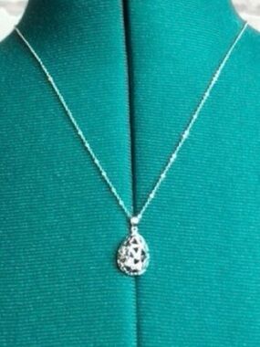 Sterling Silver Neckace with Floral Oval Shaped Pendant